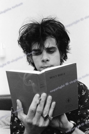 Nick Cave with bible. The Birthday Party In Leeds