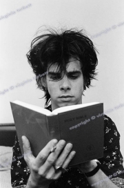 Nick Cave with bible. The Birthday Party In Leeds