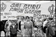 Asian women and young protestors opposing NF meeting, Ealing Tow