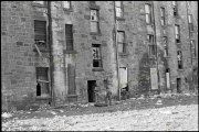 Boys playing in derelict tenements