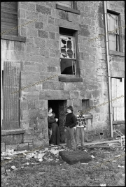 Boys playing in derelict tenements